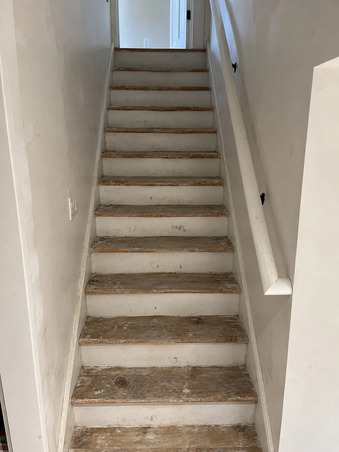 Staircase with rough construction treads during the build
